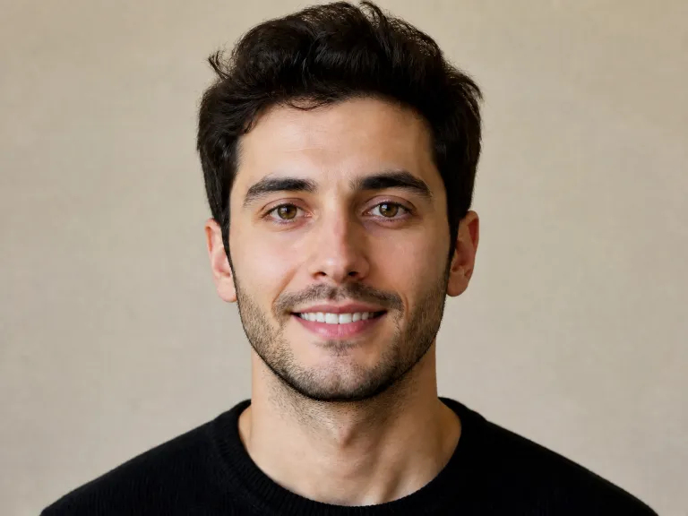 After Expression Editing The Same Portrait Keeps Identity And Background While Adding A Friendly Realistic Smile